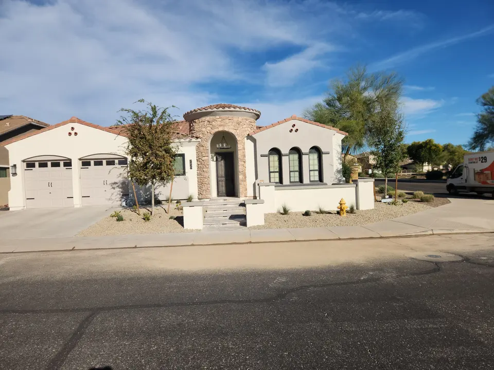 After: defined patio edges and clean concrete finish for frontyard entertaining